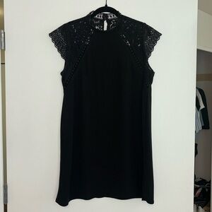 Short black polyester and lace dress